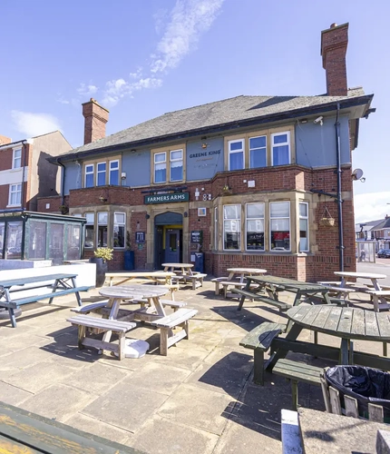 Farmers Arms pub exterior and outdoor seating on Highfield Road in Blackpool