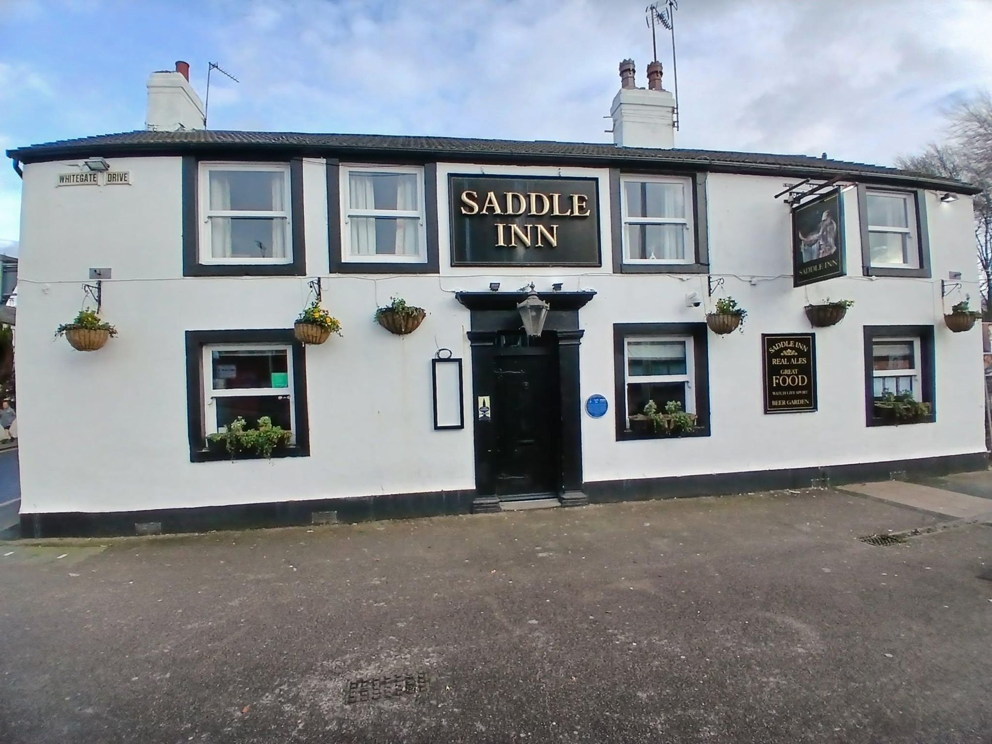 Saddle Inn pub exterior on Whitegate Drive in Blackpool