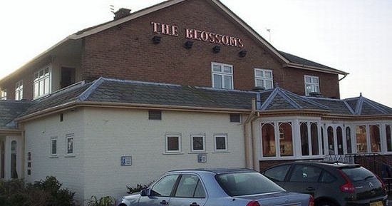 The Blossoms pub exterior on Woodlands Road in Ansdell
